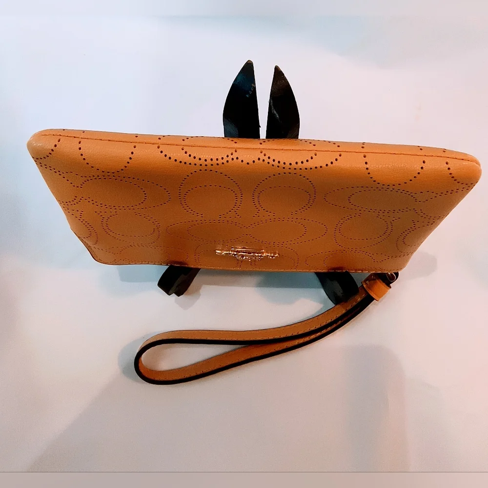 NWOT COACH Perforated Leather Corner Zip Wristlet in Honey/Tan Color